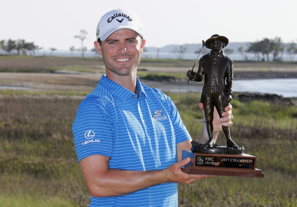 Wesley Bryan celebrates with the trophy after winning the 2017 RBC Heritage at Harbour Town Golf Links