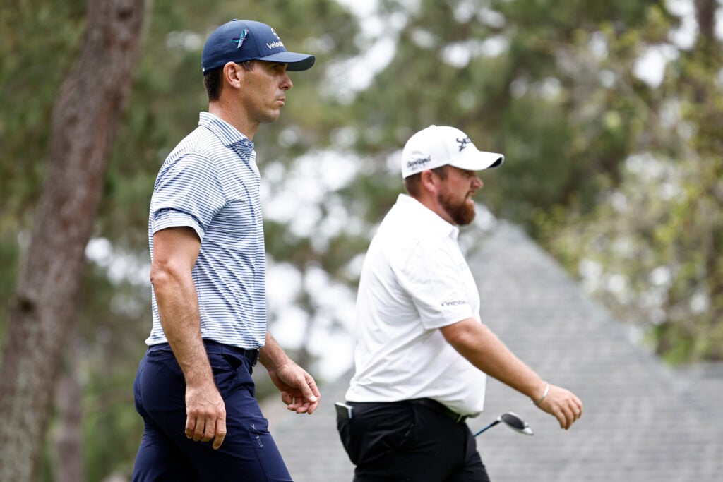 Billy Horschel and Shane Lowry walk off the eighth tee during the third round of the RBC Heritage at Harbor Town Golf Links