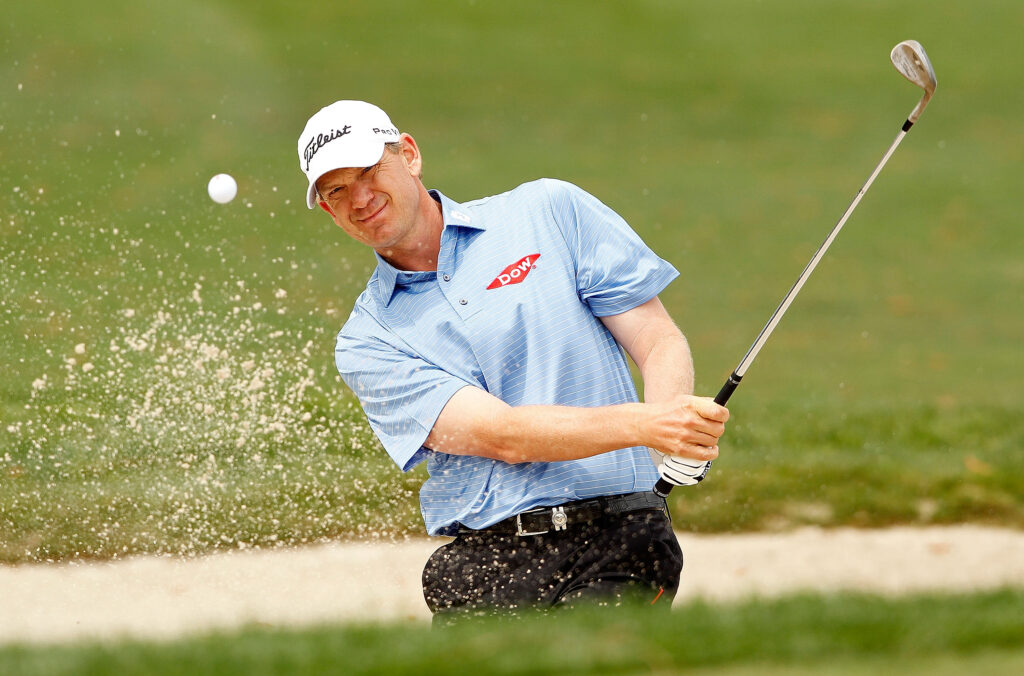 Tom Gillis hits from a bunker during the final round of the 2012 Honda Classic