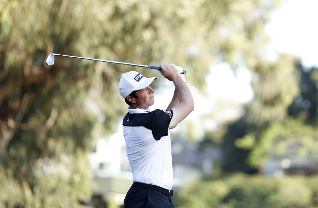 Viktor Hovland hitting an iron from the 14th tee during the second round of the The Genesis Invitational at Riviera in 2023.