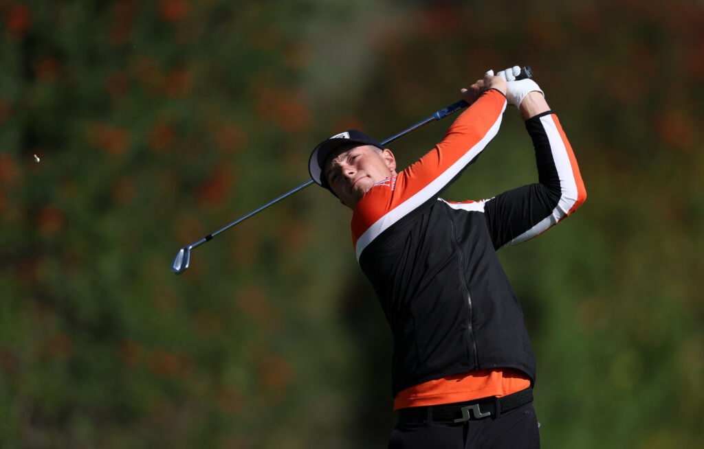 Viktor Hovland hits an iron from the fourth tee during the first round of The Genesis Invitational at Riviera Country Club in 2024.