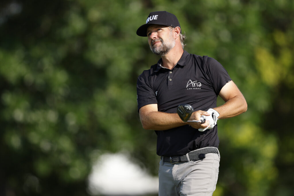 Ryan Moore plays his shot from the 10th tee during the first round of the 3M Open