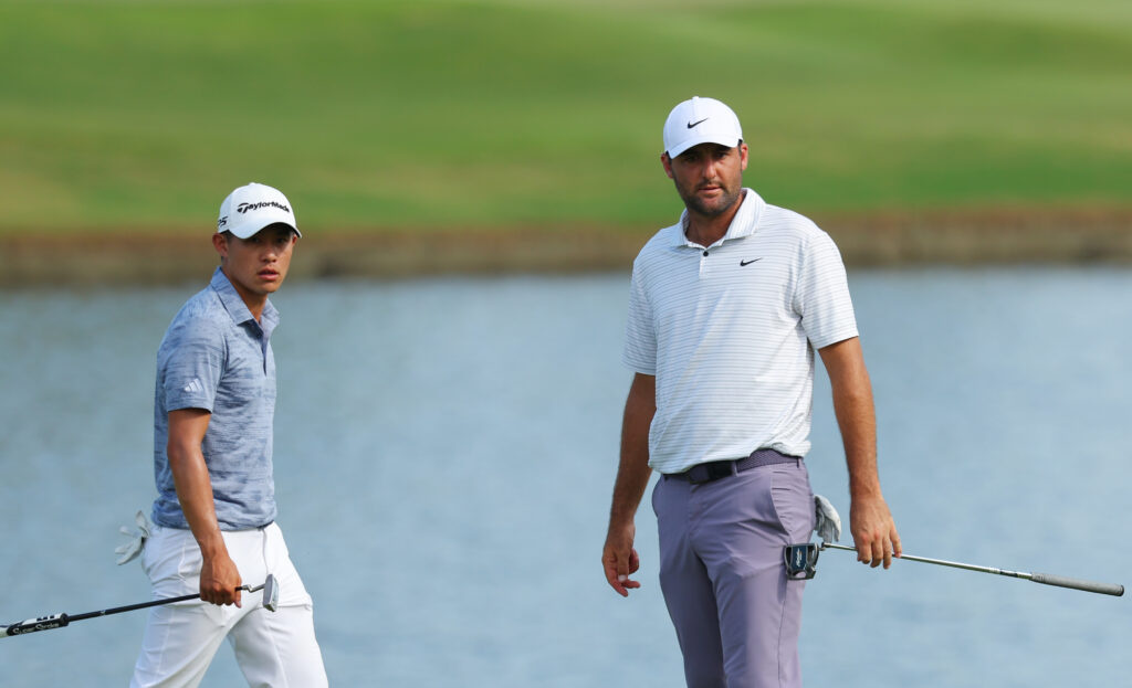 Collin Morikawa and Scottie Scheffler look on over the ninth green during the third round of the TOUR Championship at East Lake.