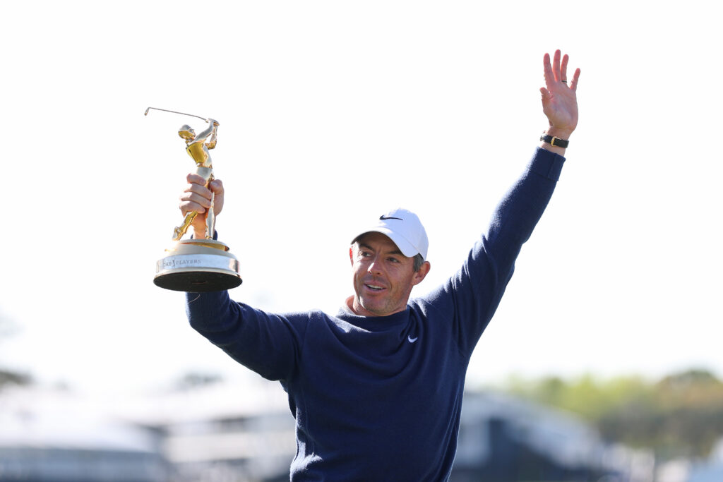 Rory McIlroy lifts the trophy after winning the 2025 Players Championship