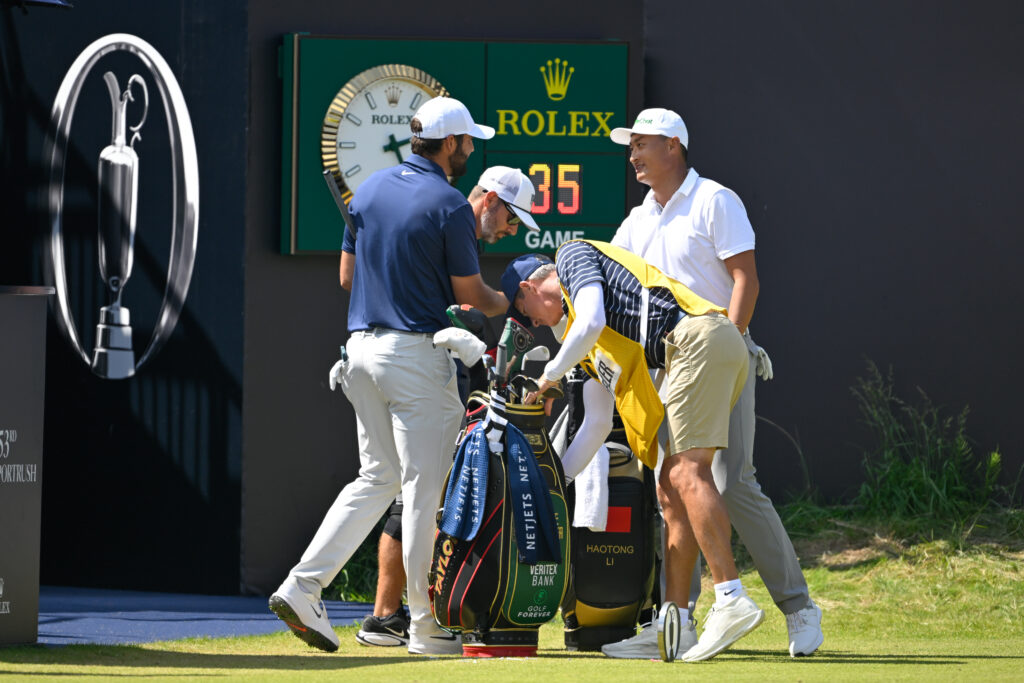 Haotong Li and Scottie Scheffler shake hands ahead of the final round of The Open Championship