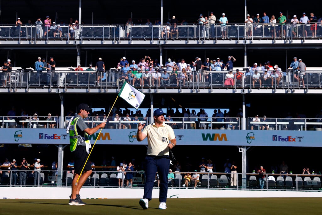 Chris Gotterup acknowledges the crowd during the first round of the WM Phoenix Open