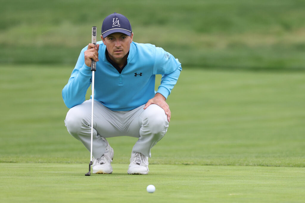 Jordan Spieth reads his putt during the third round of the AT&T Pebble Beach Pro-Am