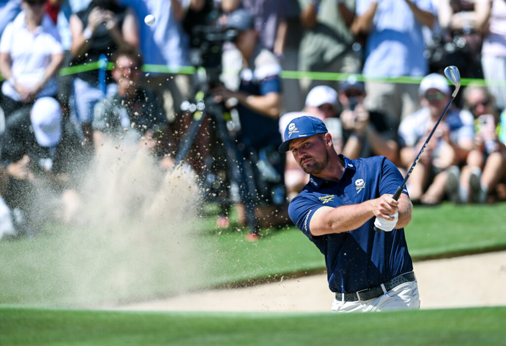 Bryson DeChambeau hits out of a bunker during the final round of LIV Golf Adelaide