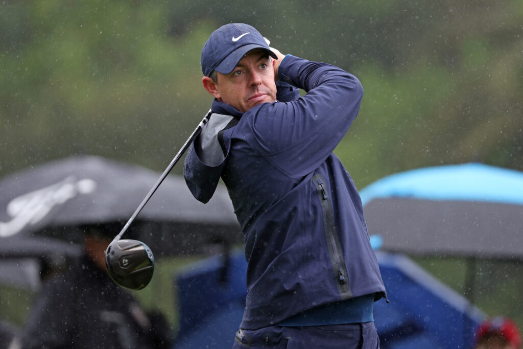 Rory McIlroy plays his shot from the second tee during the first round of The Genesis Invitational 2026 at Riviera Country Club