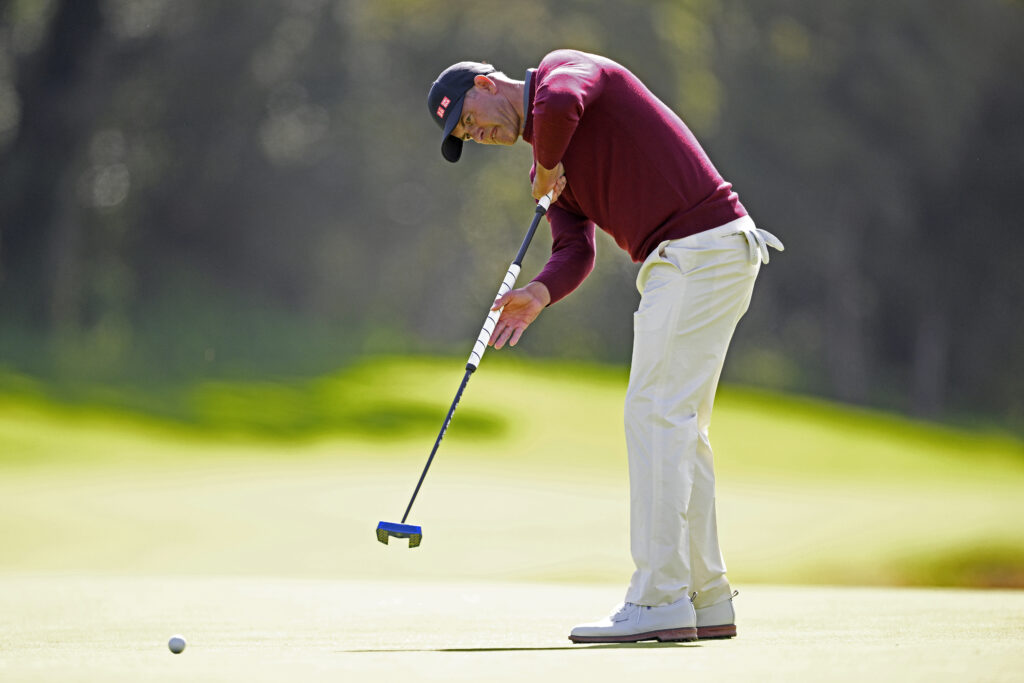 Adam Scott putts on the eighth green during the second round of The Genesis Invitational 2026 at Riviera.