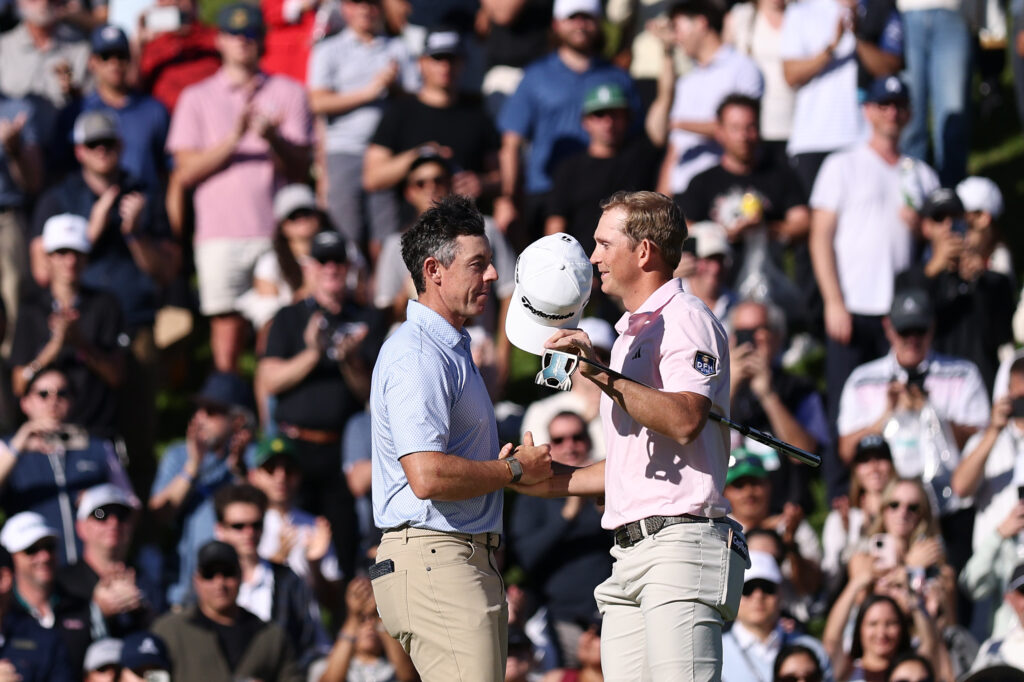 Rory McIlroy congratulates Jacob Bridgeman after his win at the Genesis Invitational at Riviera.
