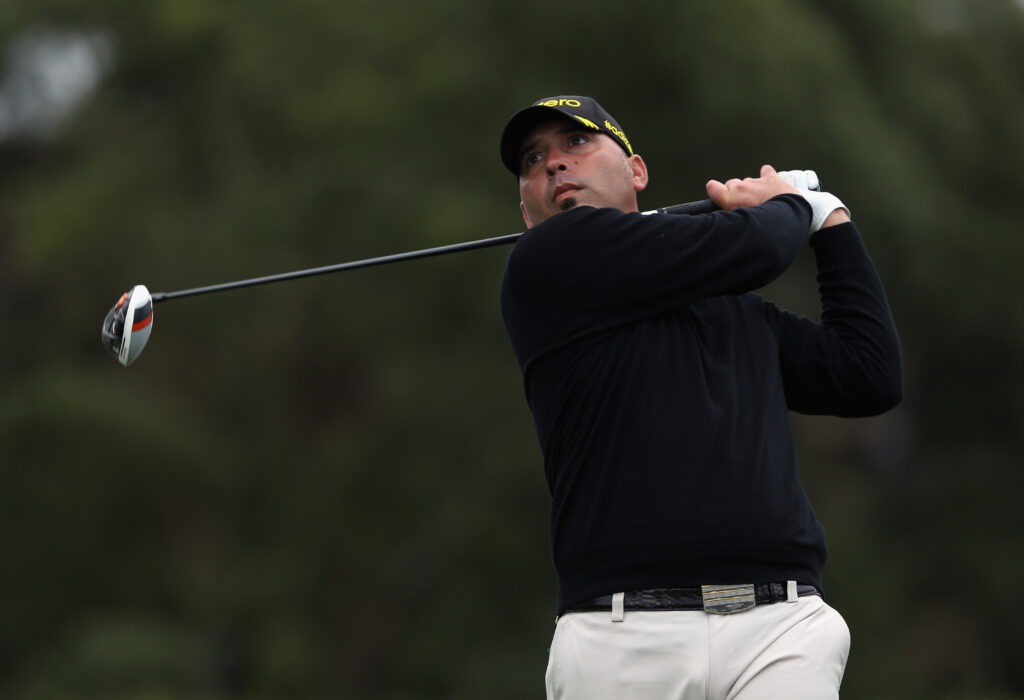 Hank Kuehne hits a tee shot during the third round of the 2013 Farmers Insurance Open