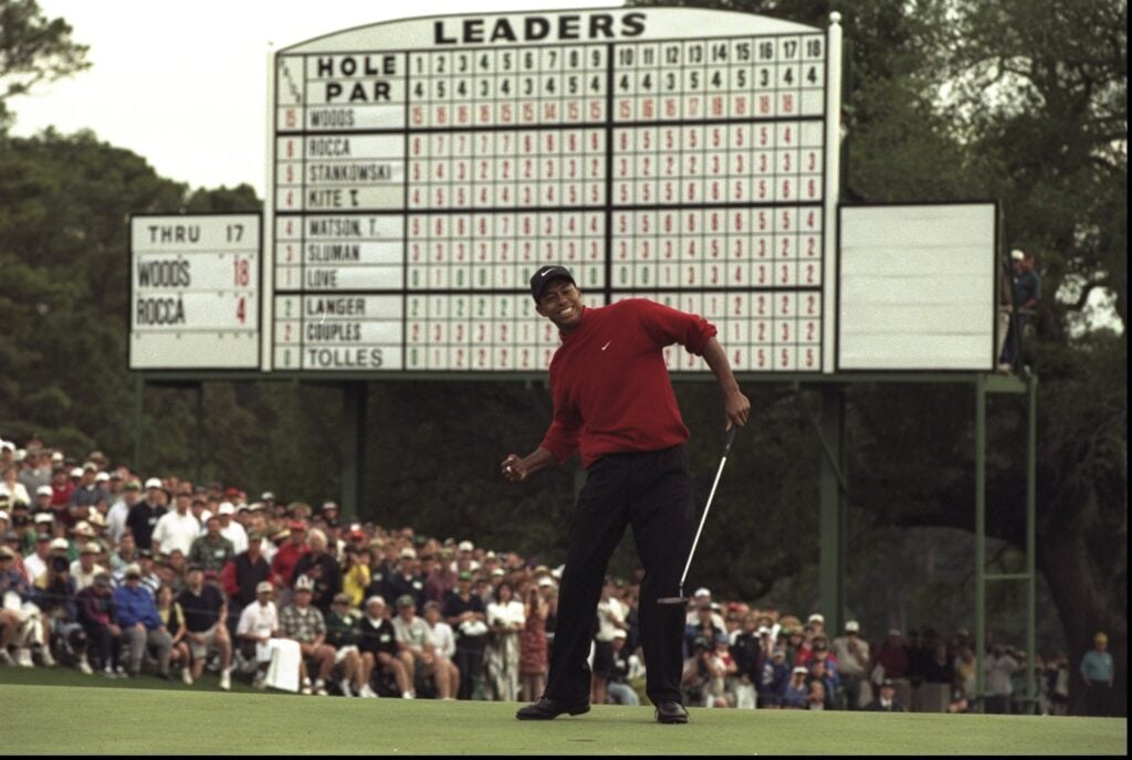 Tiger Woods of the USA celebrates after sinking a 4 feet putt to win The Masters