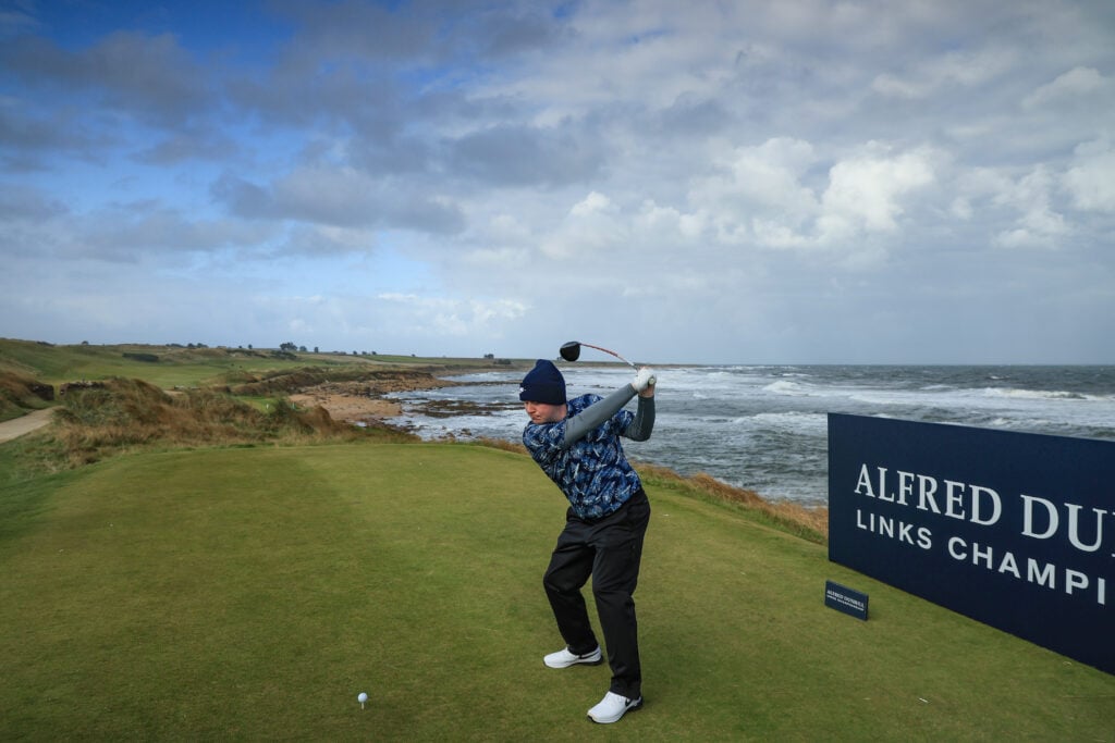 Robert MacIntyre of Scotland practices from the third tee at Kingsbarns Golf Club prior to the Alfred Dunhill Links Championship 2024