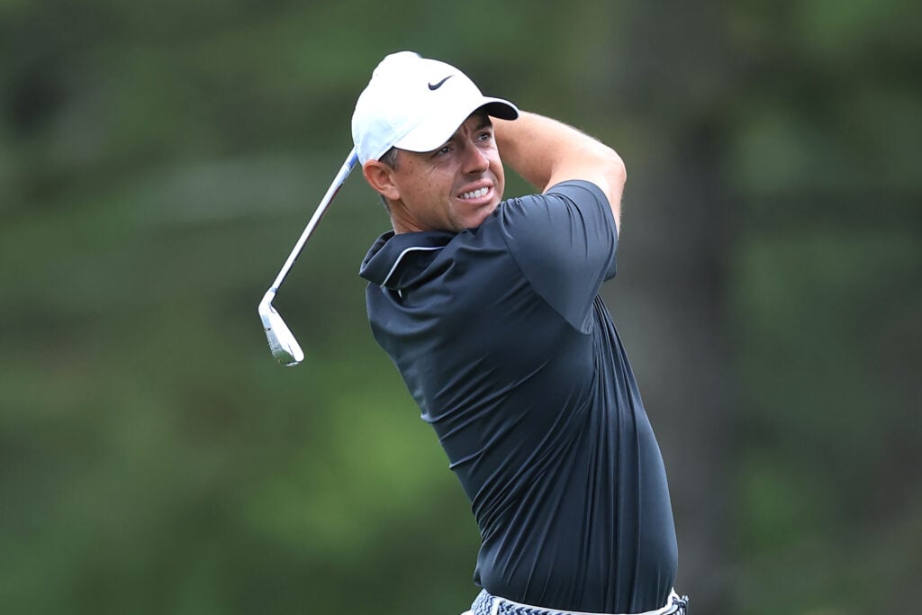 Rory McIlroy hits his second shot on the 15th hole during the second round of the 2025 Masters at Augusta National