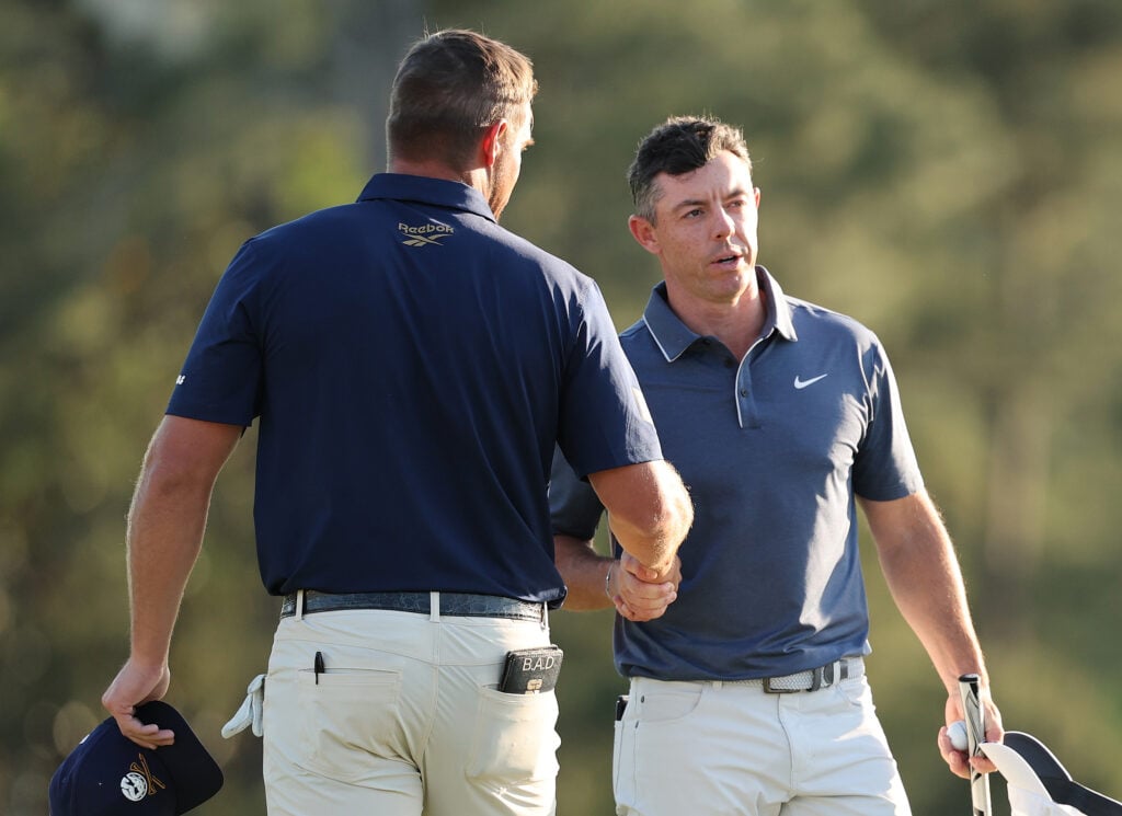 Rory McIlroy shakes hands with Bryson DeChambeau during the final round of the Masters at Augusta National