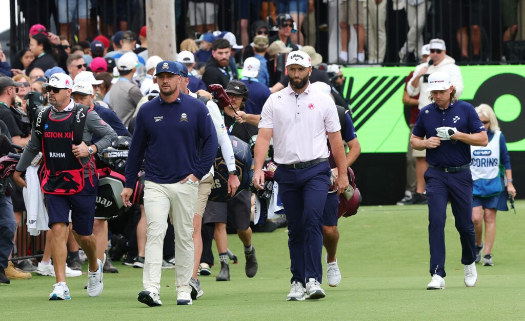 Jon Rahm and Bryson DeChambeau walk during the first round of LIV Golf Adelaide