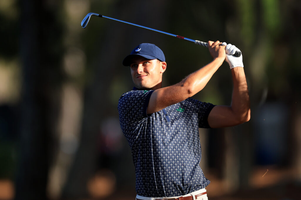 Ludvig Aberg hits his approach into the 15th hole during the third round of The Players Championship