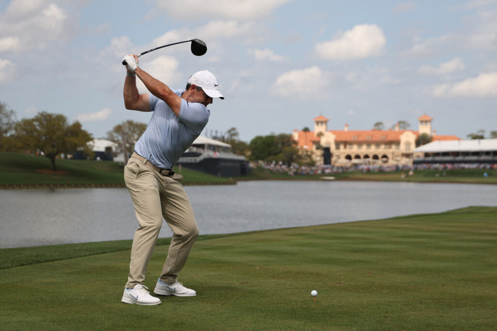 Rory McIlroy hits his tee shot on the 18th during the final round of The Players Championship