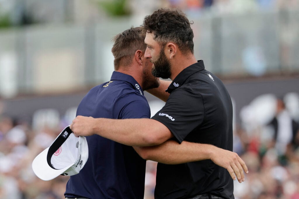Jon Rahm and Bryson DeChambeau embrace after their playoff at LIV Golf South Africa