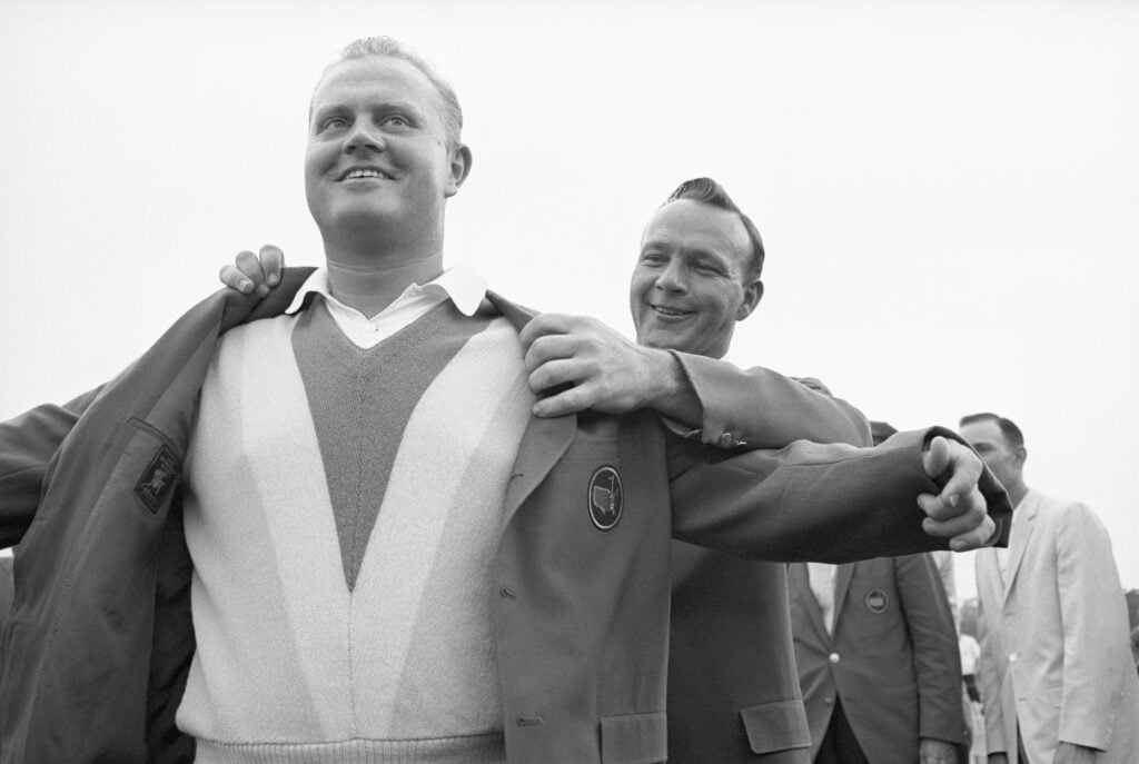 Arnold Palmer Helping Jack Nicklaus with Masters Jacket