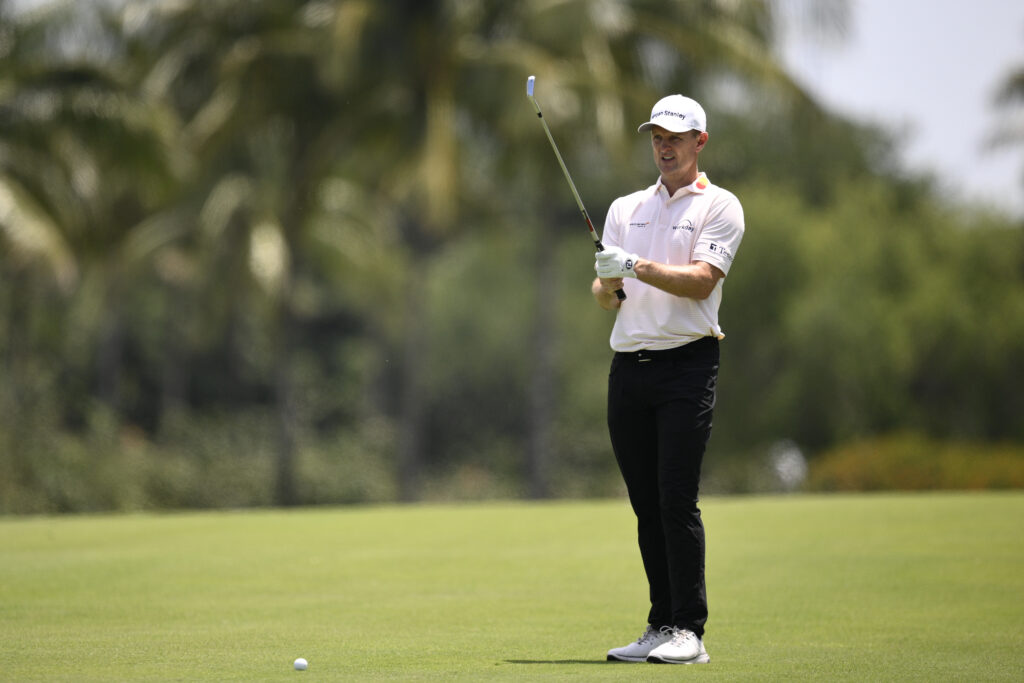 Justin Rose lines up a shot on the seventh hole during the first round of the Cadillac Championship 2026 at Trump National Doral
