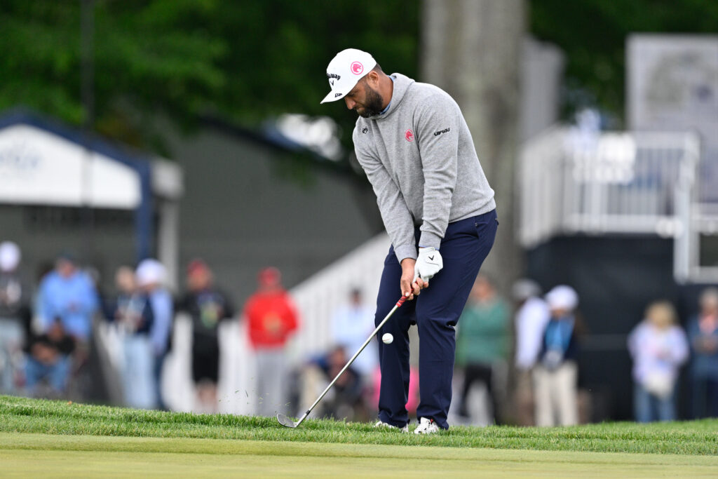 Jon Rahm hits a shot during the first round of the PGA Championship