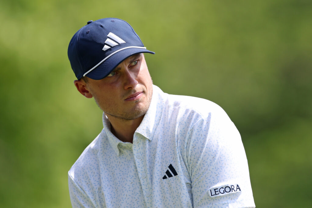 Ludvig Aberg of Sweden prepares to play a shot from the second tee during the final round of the PGA Championship at Aronimink Golf Club