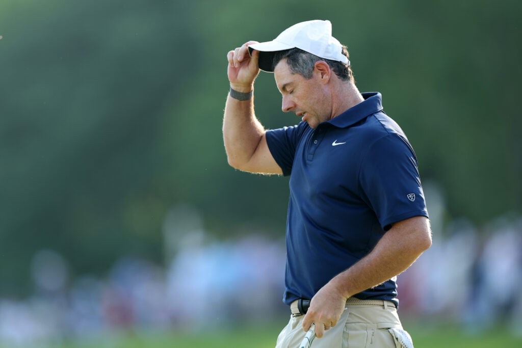 Rory McIlroy of Northern Ireland looks on from the 18th green during the final round of the PGA Championship at Aronimink Golf Club