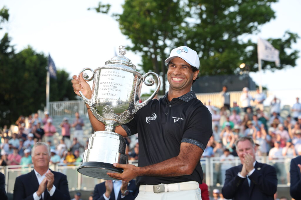 Aaron Rai of England celebrates with The Wanamaker Trophy after winning during the final round of the PGA Championship at Aronimink Golf Club