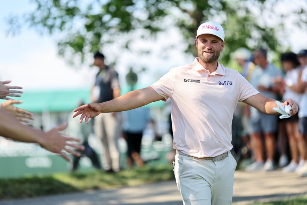 Wyndham Clark walks to the 17th hole during the final round of the Memorial Tournament