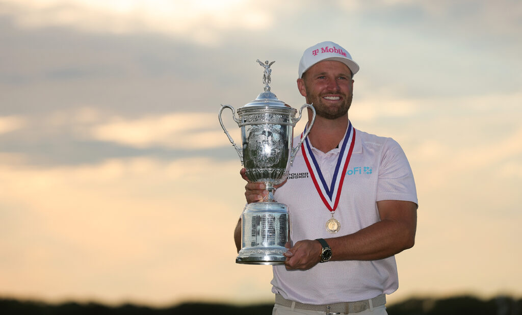 Wyndham Clark of the United States poses with the trophy following the final round of the 126th U.S. OPEN at Shinnecock Hills Golf Club