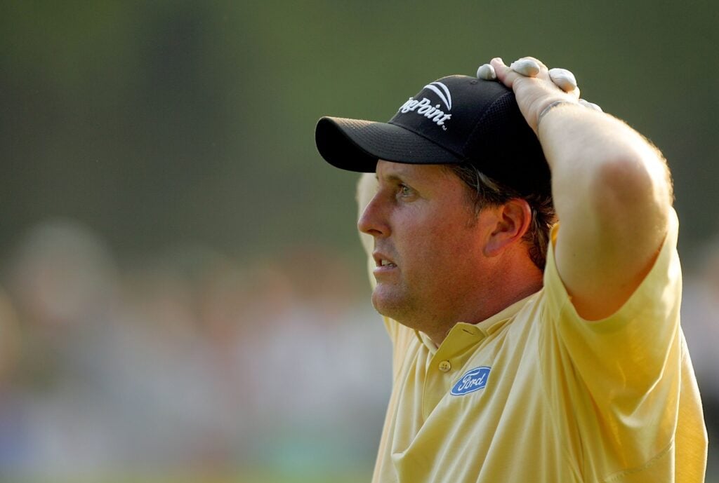 Phil Mickelson waits on the fairway on the 18th hole during the final round of the 2006 US Open Championship at Winged Foot Golf Club on June 18, 2006