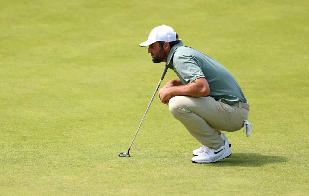 Scottie Scheffler lines up a putt during the final round of the Scottish Open