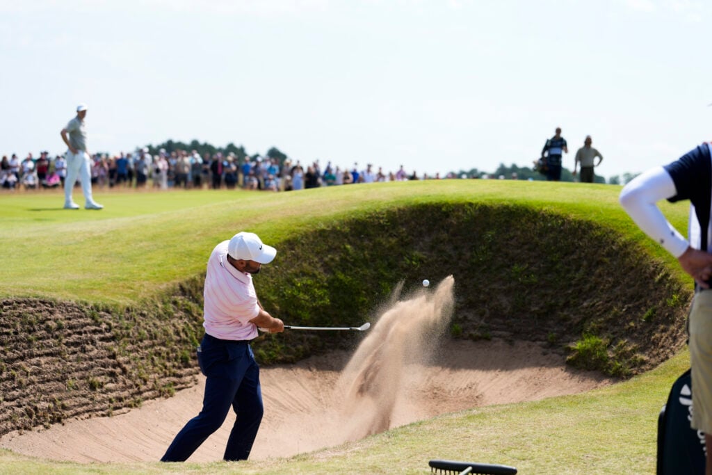 Scottie Scheffler in a green side bunker on the eighth hole during the second round of Genesis Scottish Open at The Renaissance Club