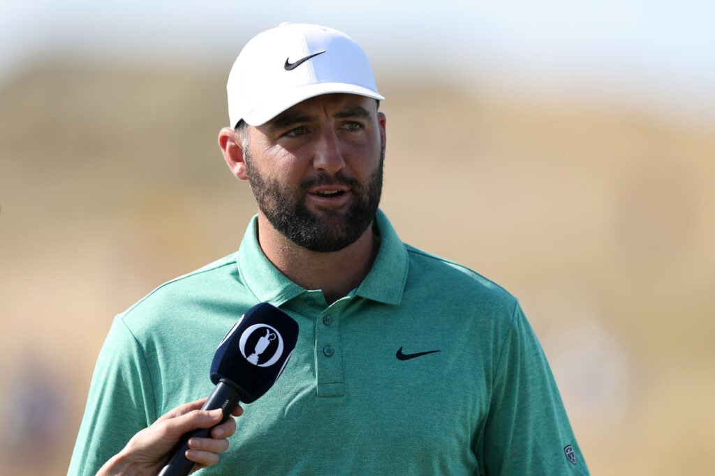 Scottie Scheffler speaks to the media during a practice round ahead of The Open Championship