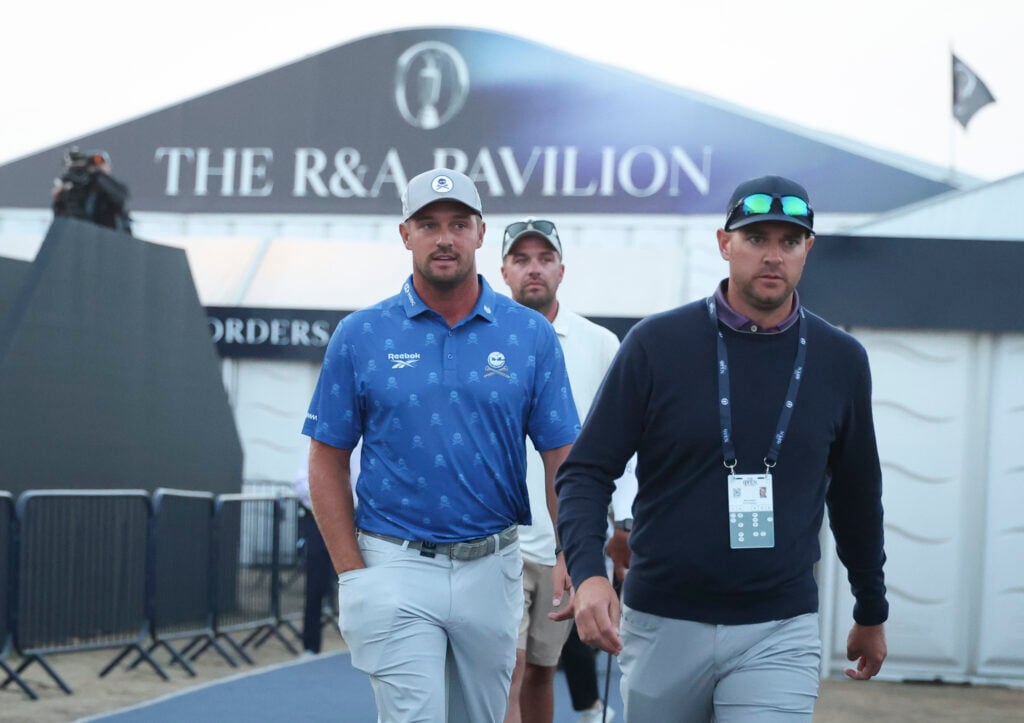 Bryson DeChambeau leaves the scoring tent after receiving a two-shot penalty during the final round of The Open Championship
